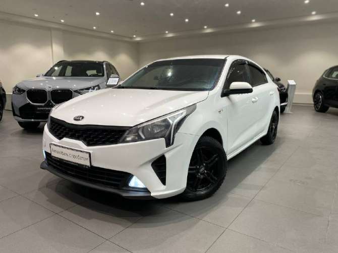 Kia Rio 1.4 AT (100 л.с.)
